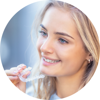 round image girl putting on invisalign